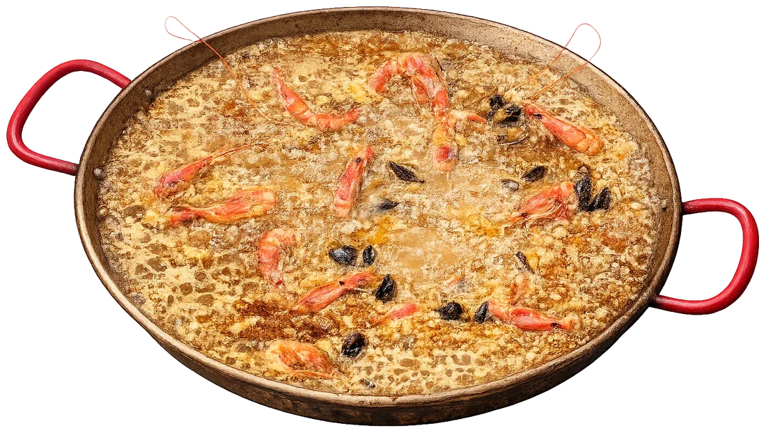 Arròs a la paella amb gambes i musclos